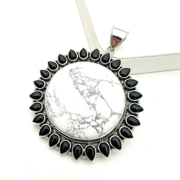 BLACK ONYX WHITE HOWLITE RISING SUN PENDANT (MW 13)