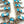 Load image into Gallery viewer, (RARE PIECE) EFFIE CALAVAZA ZUNI SLEEPING BEAUTY TURQUOISE SNAKE SQUASH BLOSSOM NECKLACE 22" &amp; POST BACK EARRINGS HANDMADE SET (NP 33)
