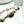 Load image into Gallery viewer, NATIVE HANMADE SONORAN GOLD TURQUOISE SS BANGLE 2 3/4" DIAMETER (JR 172)
