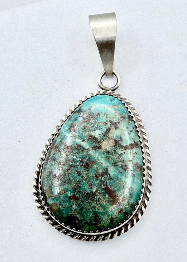 LONE MOUNTAIN TURQUOISE OVAL PENDANT BY LESLIE NEZ (PN 4)