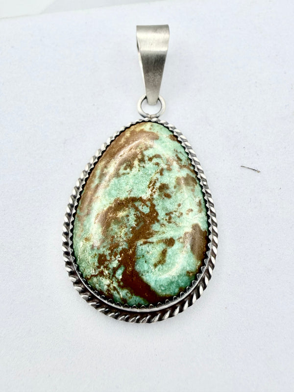 ROYSTON TURQUOISE OVAL NATIVE PENDANT BY LESLIE NEZ (PN 3)
