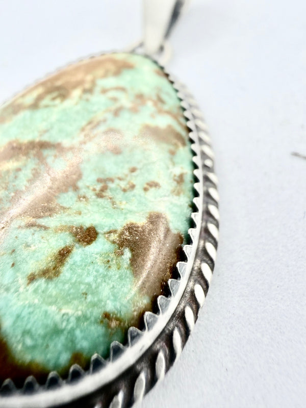 ROYSTON TURQUOISE OVAL NATIVE PENDANT BY LESLIE NEZ (PN 3)