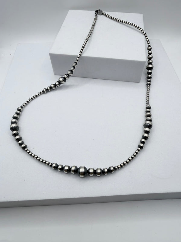 GRADUATED NAVAJO PEARLS 3-7MM NECKLACE 22" (MW 472)