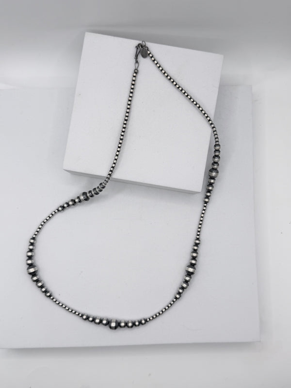 GRADUATED NAVAJO PEARLS 3-7MM NECKLACE 22" (MW 472)