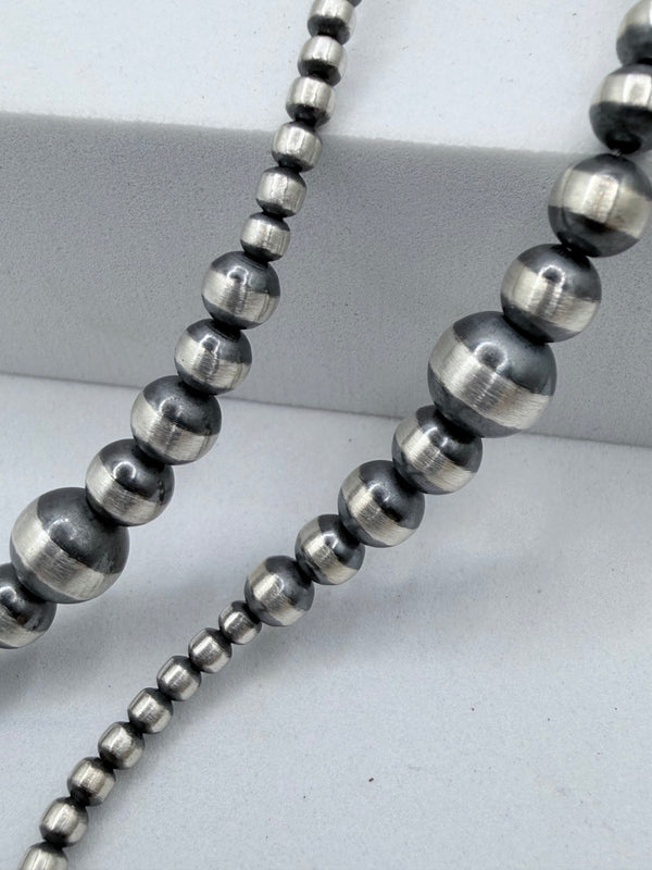 GRADUATED NAVAJO PEARLS 3-7MM NECKLACE 22" (MW 472)